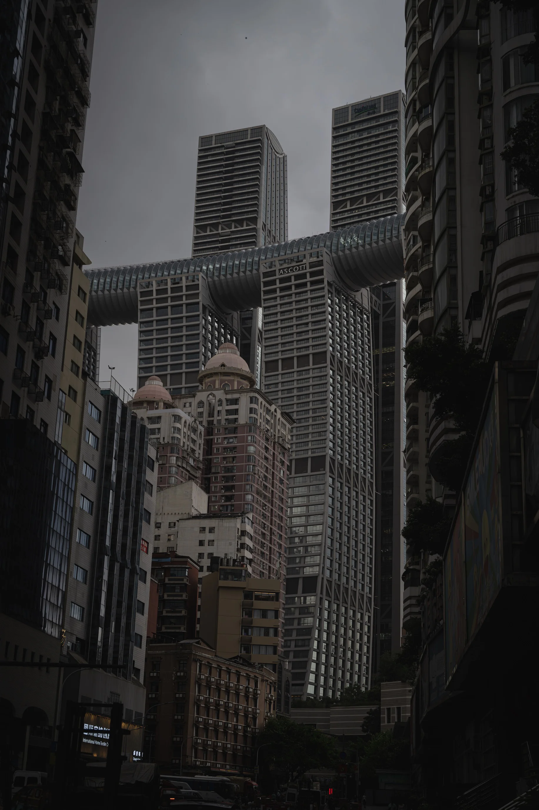 Raffles City towers in storm light