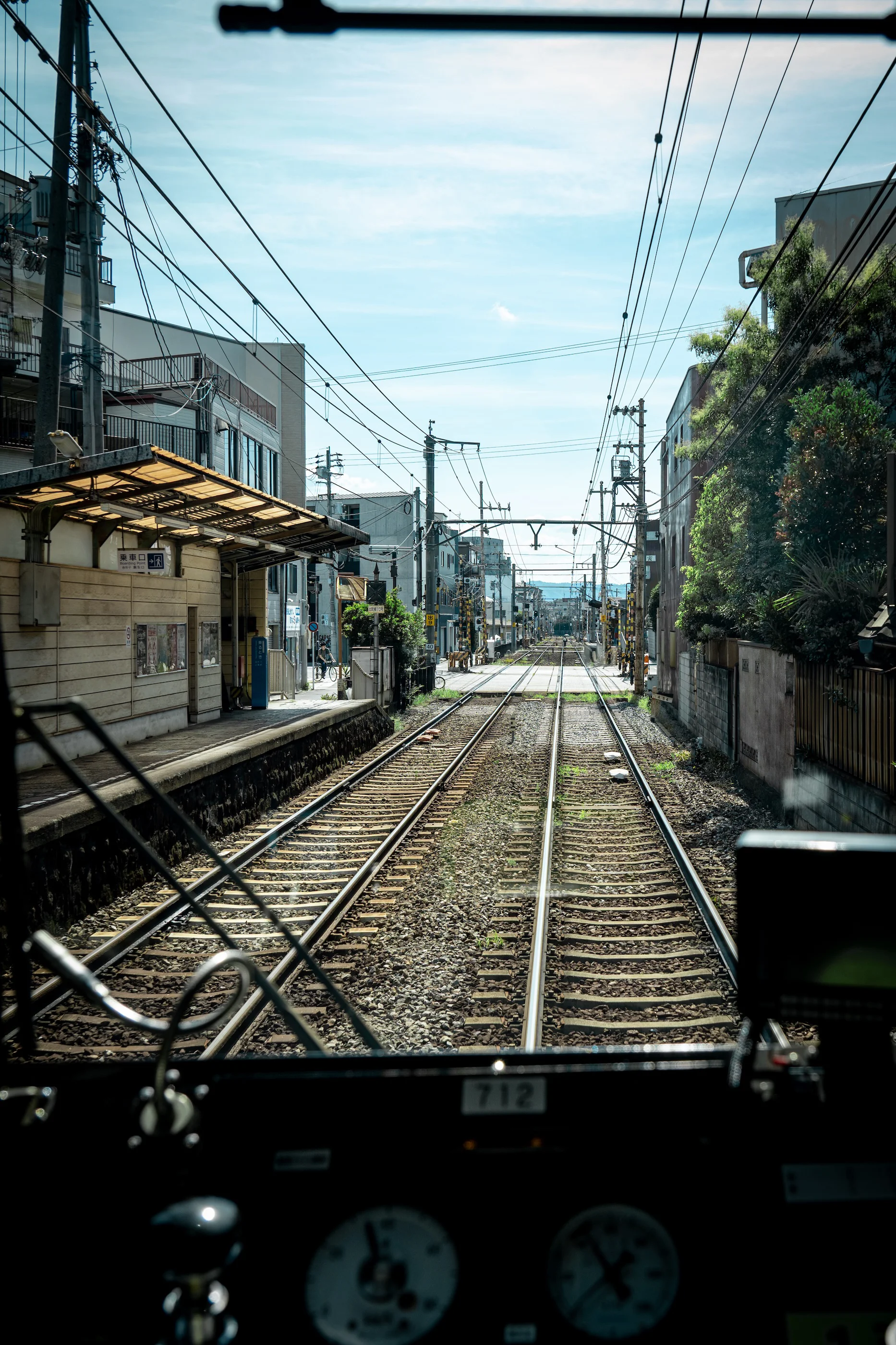 Kyoto railway tracks seen from inside a tram